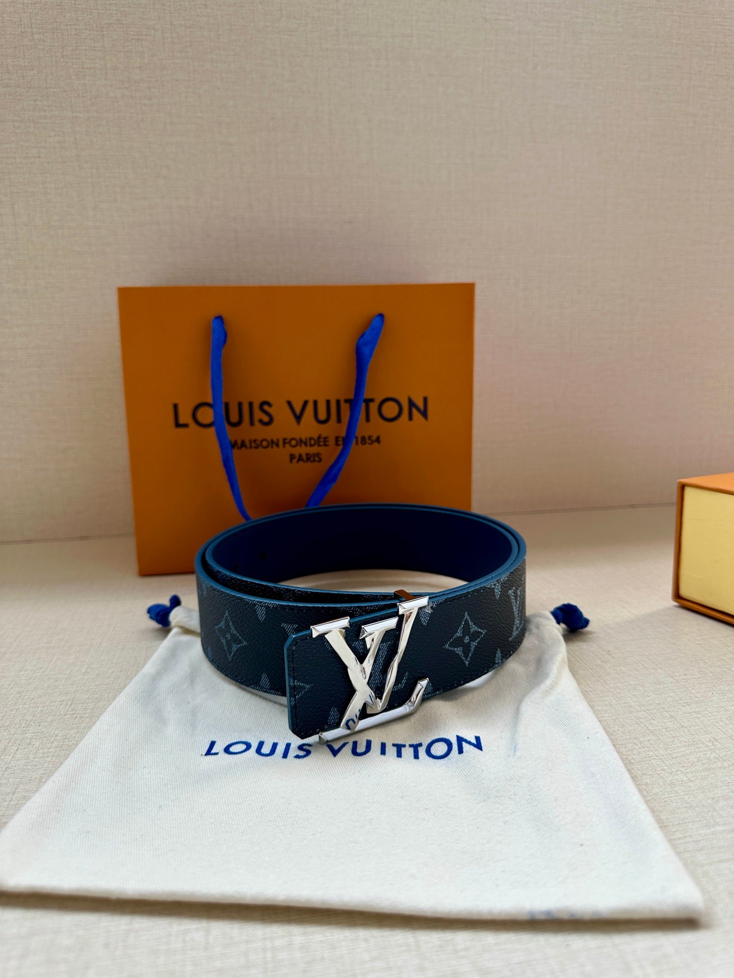 Louis Vuitton dark blue monogram belt with gold buckle and blue loop ends