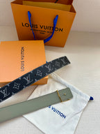 Louis Vuitton monogram belt with silver buckle and light gray inner panel