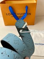 Louis Vuitton belt in blue monogram canvas with silver buckle and stitched end, close-up