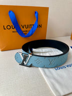 Louis Vuitton belt in blue monogram canvas with silver buckle and keeper, side view