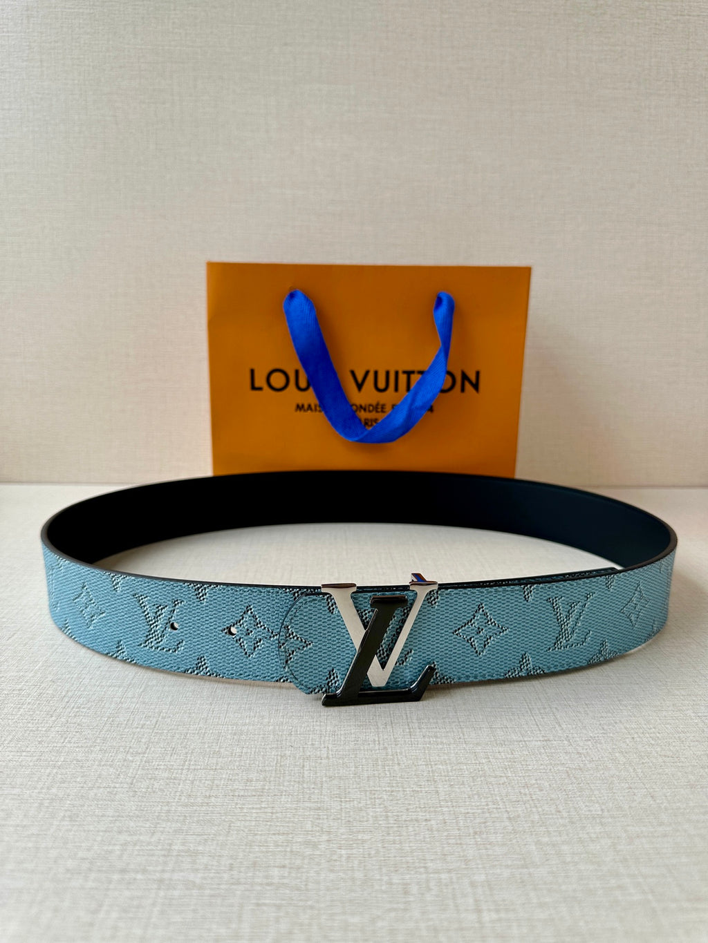Louis Vuitton belt in blue monogram canvas with silver-tone buckle, flat
