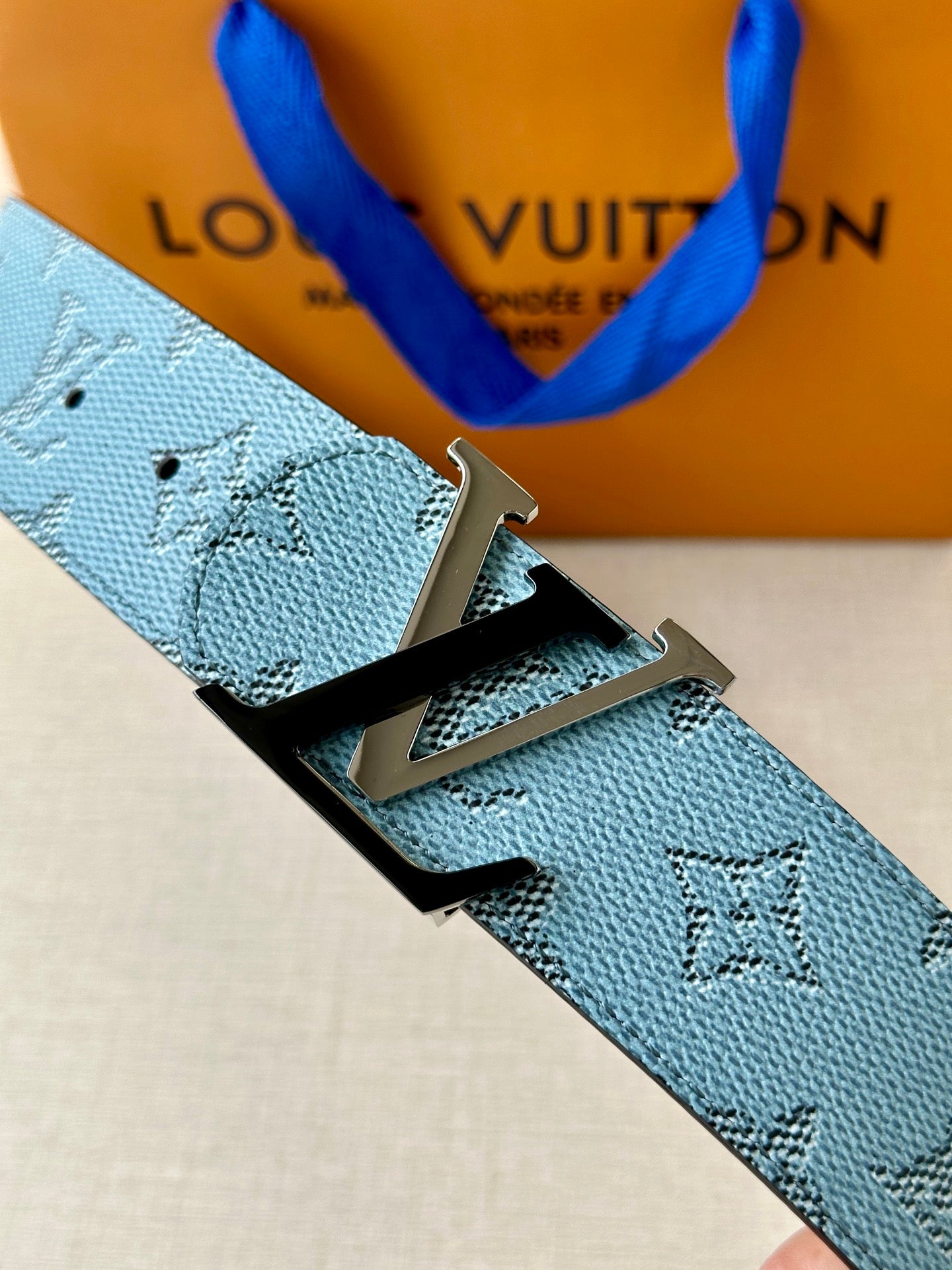 Louis Vuitton belt strap in blue monogram canvas with silver buckle detail, prong