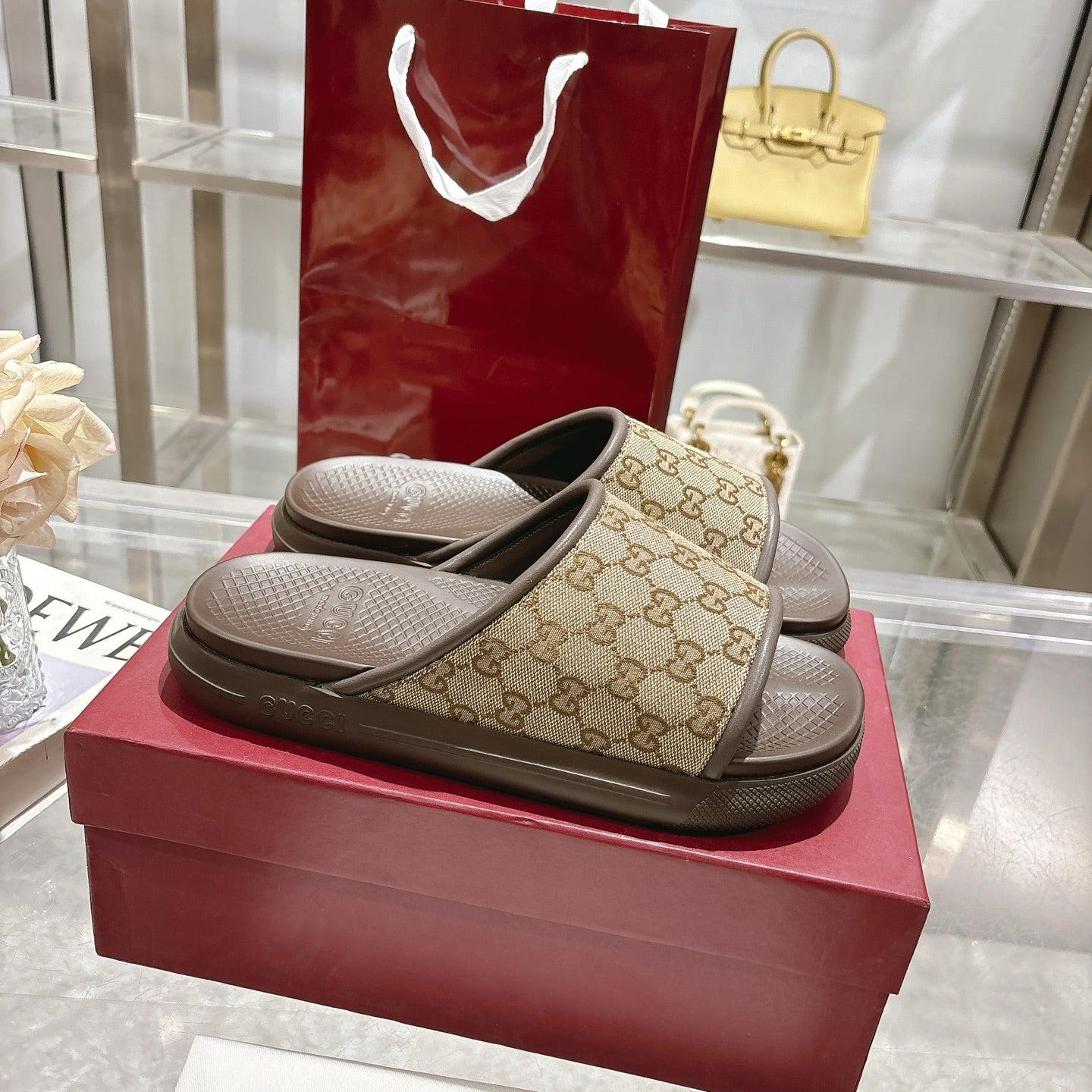 Gucci GG slide sandals, tan monogram straps with dark footbed