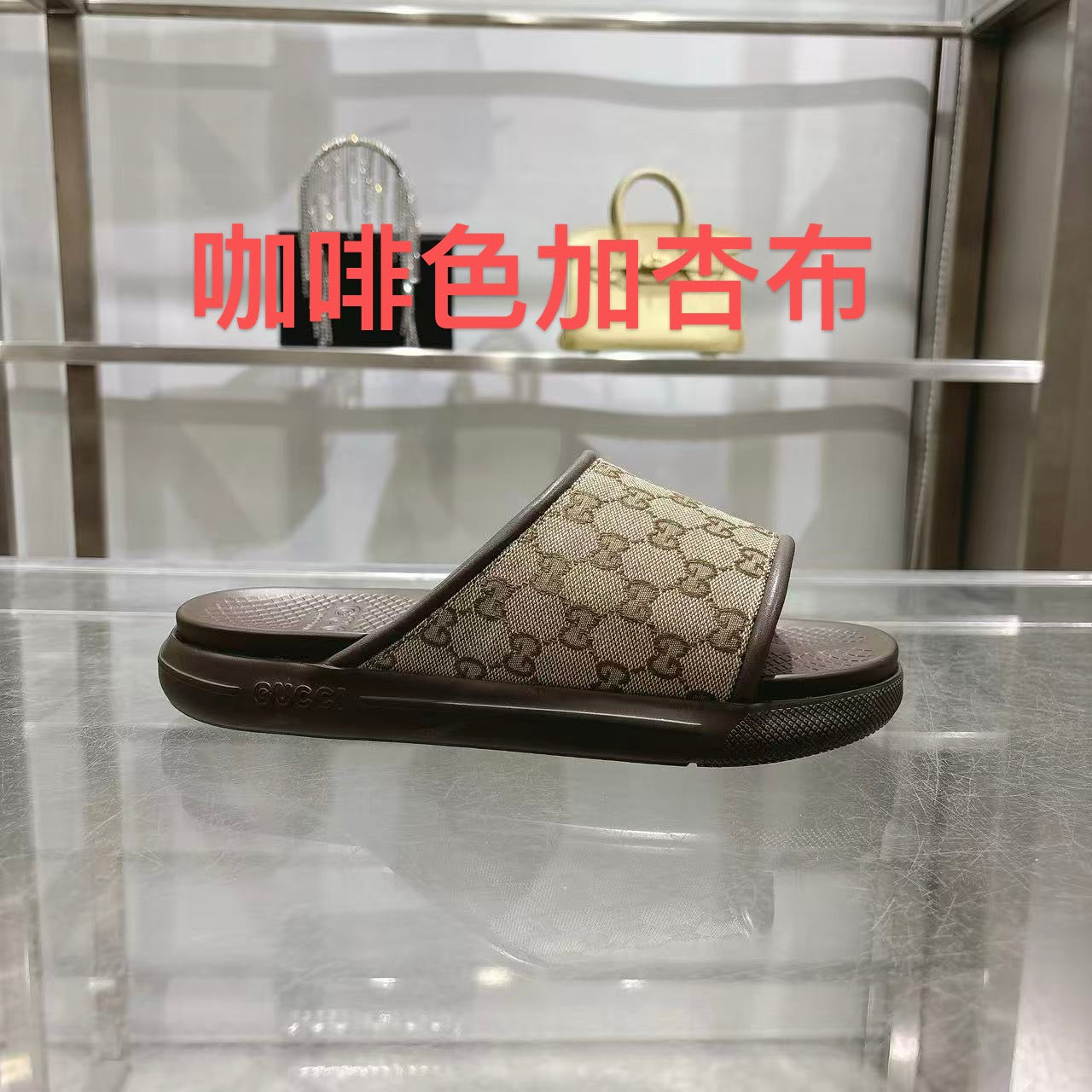 Gucci GG slide sandals with open toe, tan canvas and dark rubber sole