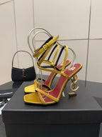 YSL heeled sandals with yellow straps, red trim, open toe, gold-tone hardware