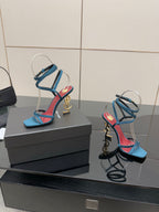 YSL ladies’ strappy heeled sandals with blue straps and red lining, gold hardware visible