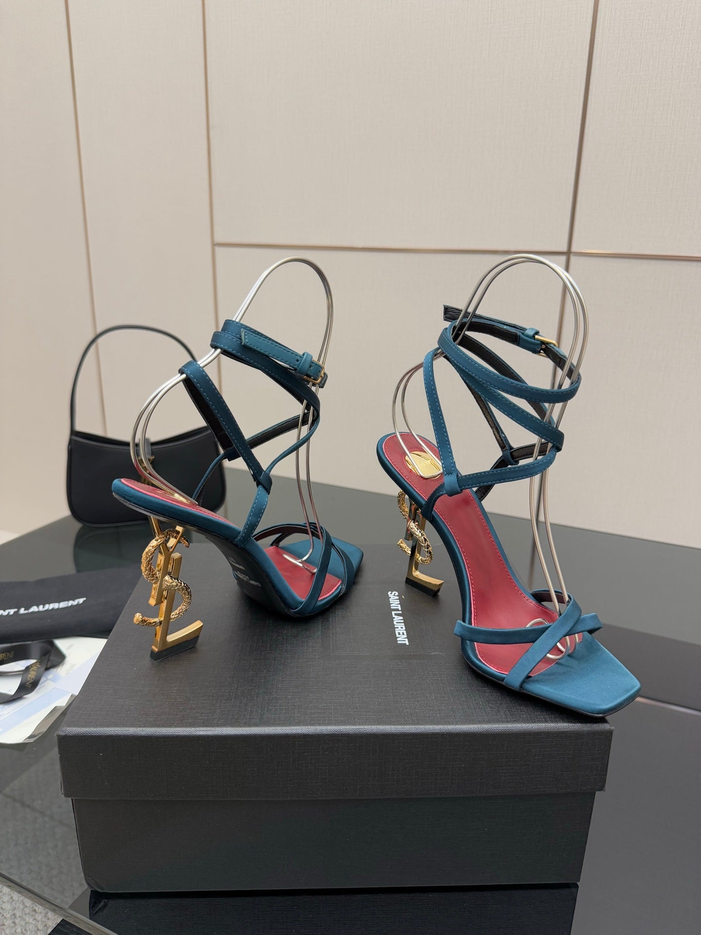 YSL ladies’ heeled sandals, blue footbed with red trim and gold charm hardware