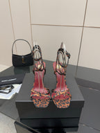 Leopard print strappy high-heel sandals with red/pink uppers and gold heel details