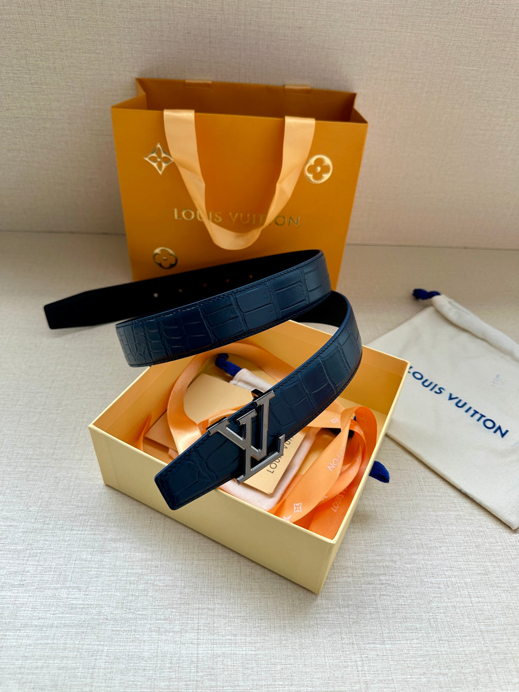 Blue embossed leather belt with oversized LV buckle in gift box