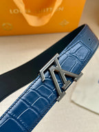 Blue embossed belt strap with silver-toned LV buckle detail