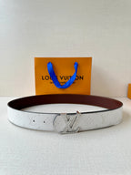 Louis Vuitton belt in light gray textured leather with brown edge and metal buckle