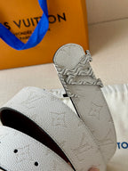 Louis Vuitton belt end: light gray textured strap with dark brown inner edge