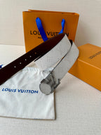 Louis Vuitton belt on dust bag: light gray textured strap with dark brown underside