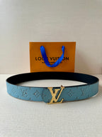 Louis Vuitton belt, blue monogram strap with gold buckle and black underside.