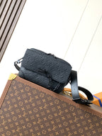 Dark monogram leather crossbody bag with flap and adjustable shoulder strap