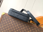 Navy monogram leather crossbody bag with long strap and zippered front pocket