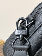Leather crossbody bag with ring hardware and stamped logo plate