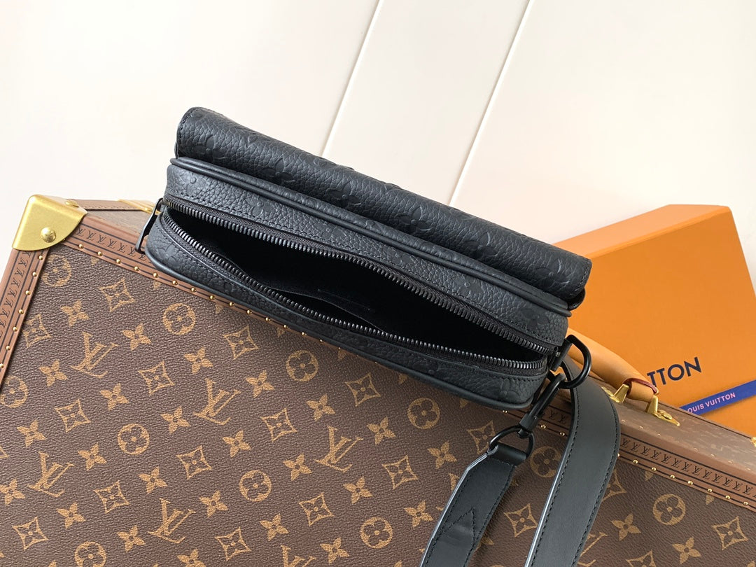 Dark monogram leather crossbody bag with double zipper and side strap
