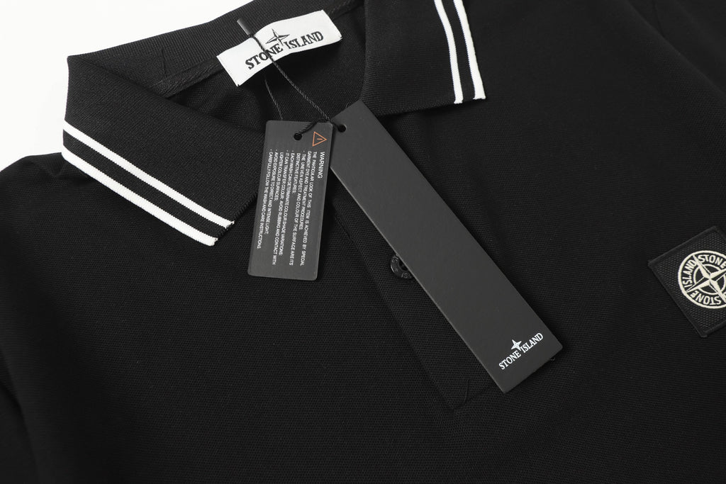 Black polo collar with striped tape and Stone Island neck label