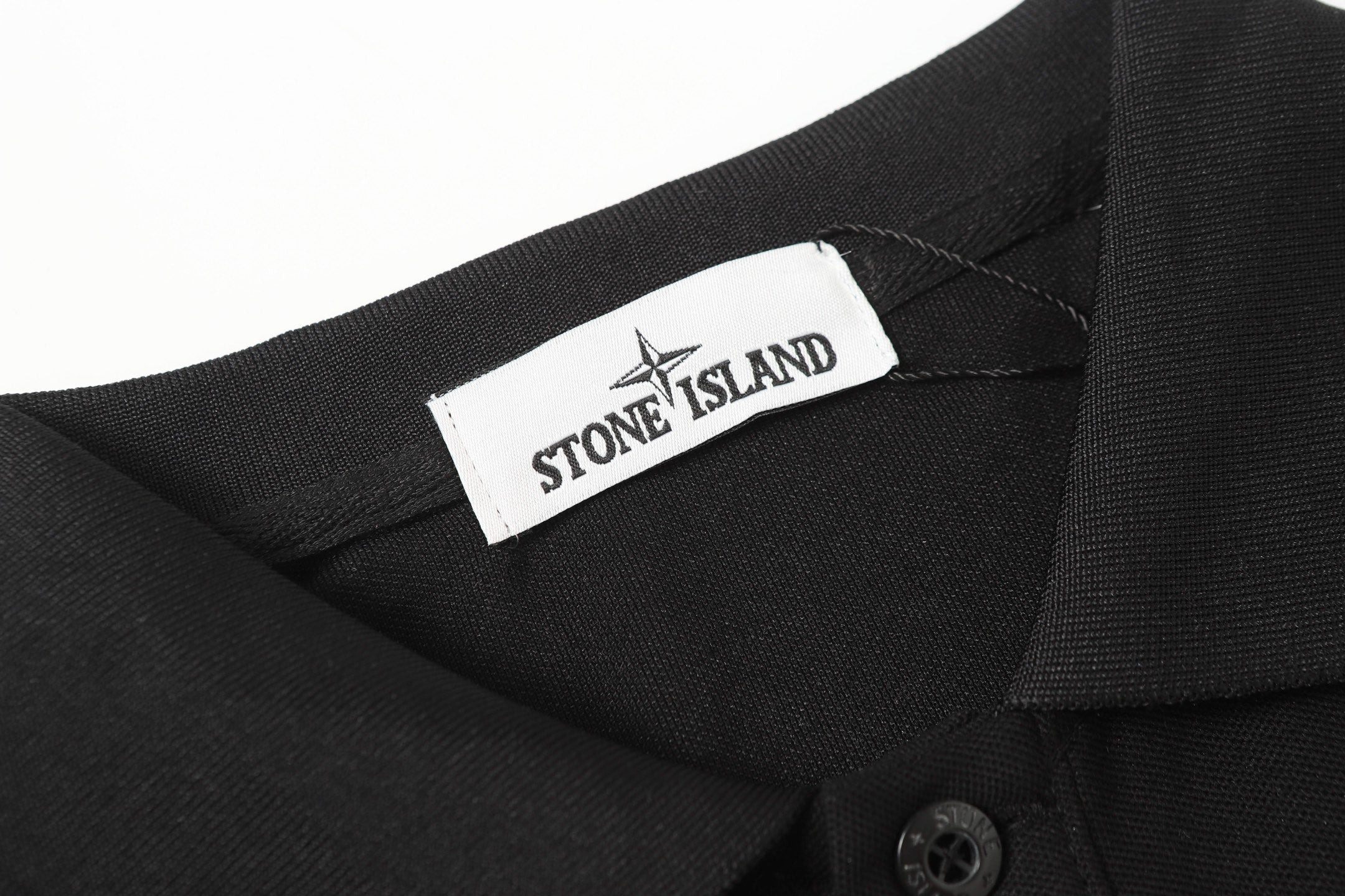 Black polo shirt interior collar with neck label