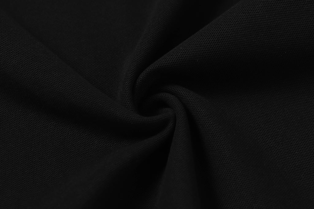 Black polo shirt knit fabric close-up