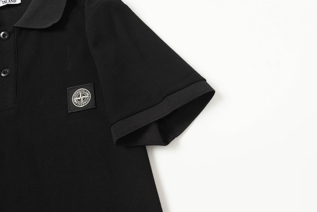 Black polo shirt sleeve and chest logo patch