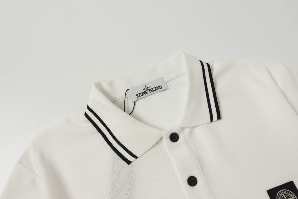 White polo shirt neckline with black striped collar and two-button placket