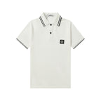 White polo shirt with black striped collar and button placket