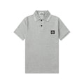 Light gray Stone Island polo shirt with striped collar and chest badge
