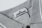 Light gray polo collar with Stone Island logo label