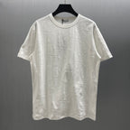 White Dior short-sleeve T-shirt with subtle embossed pattern and crew neckline