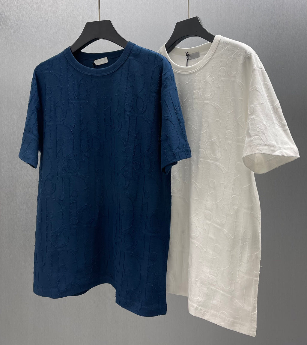 Blue and white Dior short-sleeve T-shirts with embossed pattern, hanging side by side