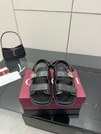 Gucci women's black patterned sandals with double-G buckle and adjustable straps