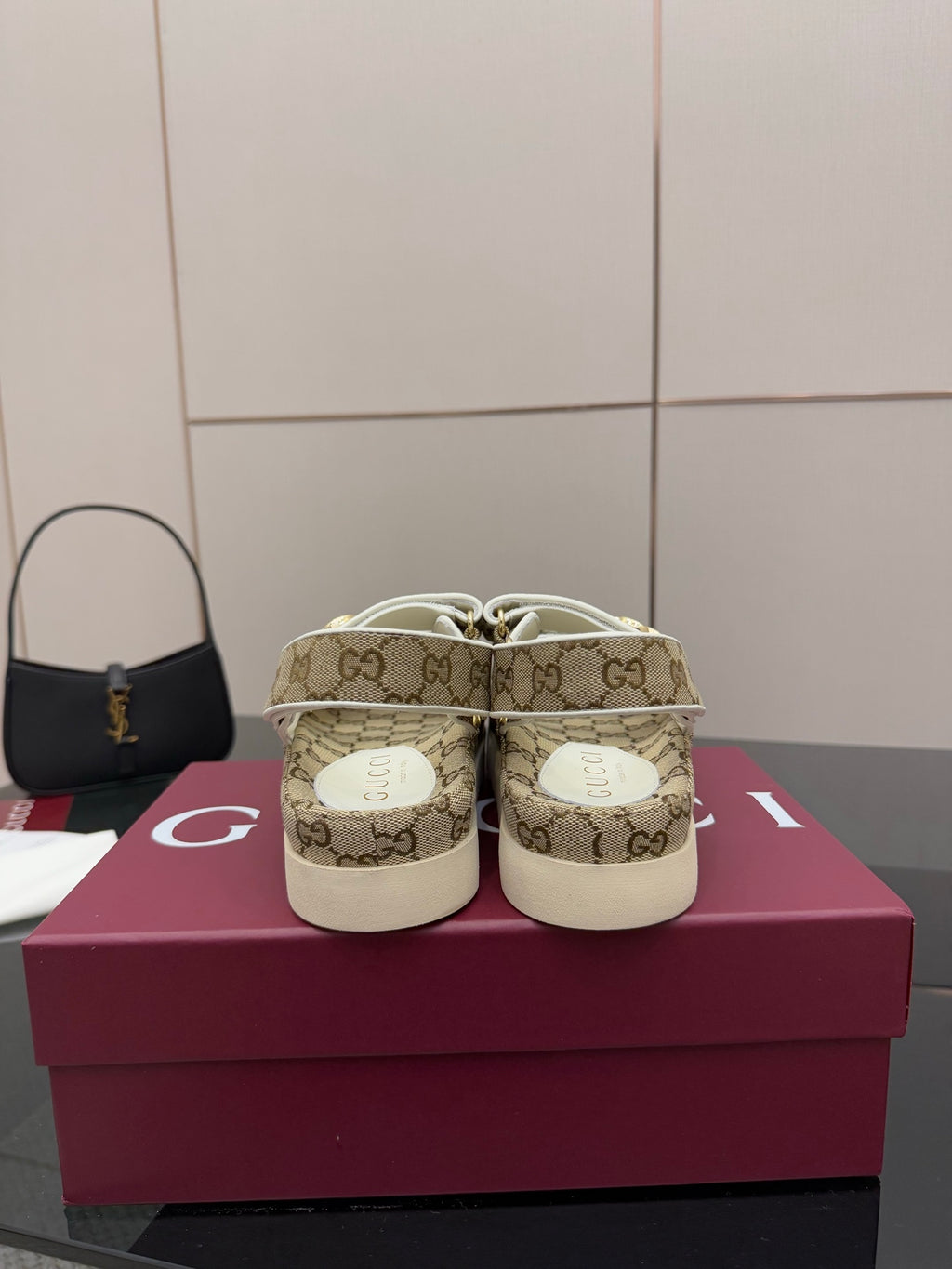 Gucci women’s sneakers showing heel and back in beige GG canvas