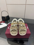 Gucci women’s sneakers in beige GG canvas with gold buckle and white trim