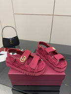 Gucci women’s platform sneakers in fuchsia, GG logo pattern with double strap and gold rings