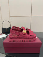 Gucci women’s platform sneakers, fuchsia GG monogram upper with hook-and-loop straps