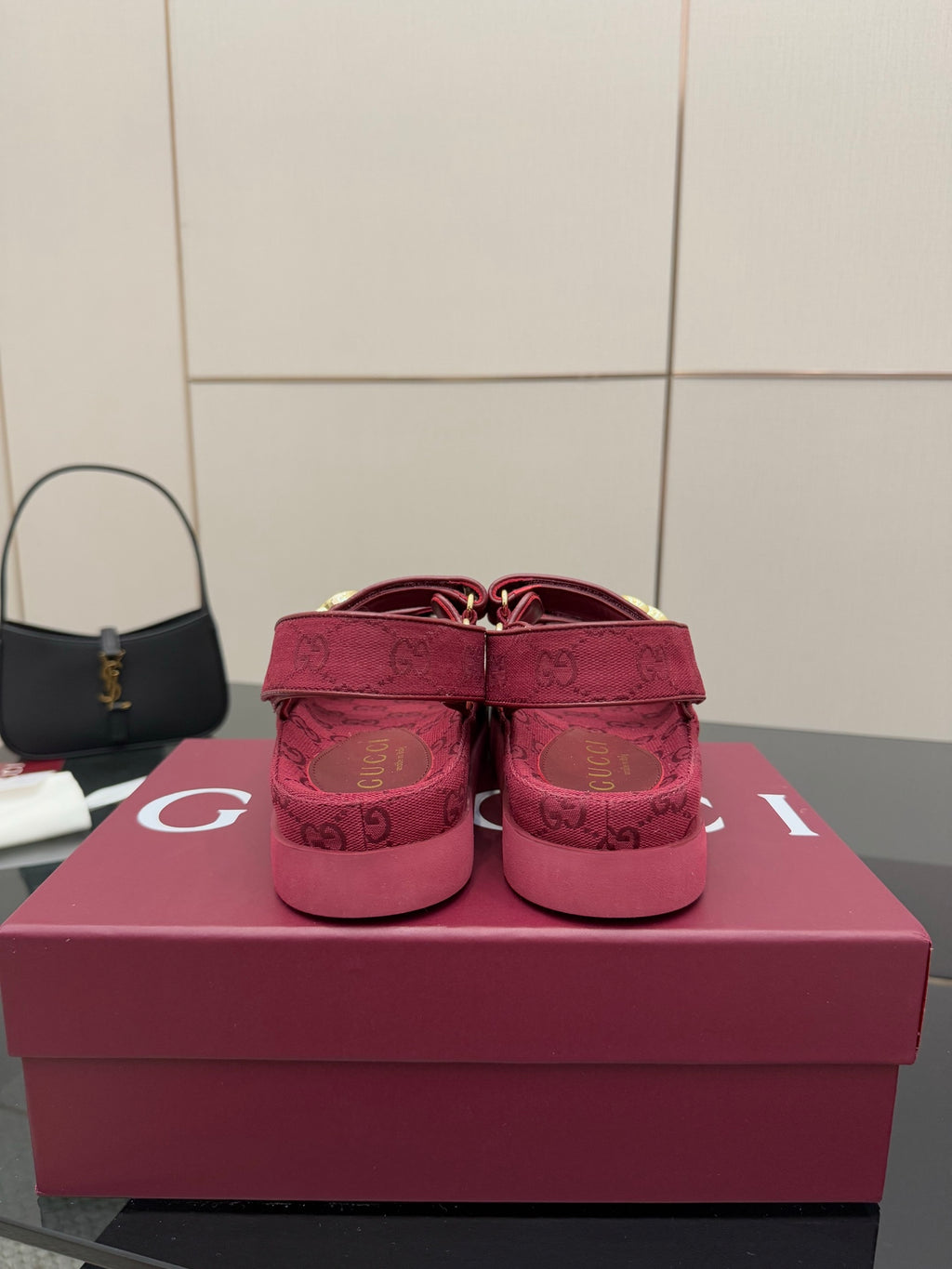 Gucci women’s platform sneakers, fuchsia GG monogram back view with adjustable strap