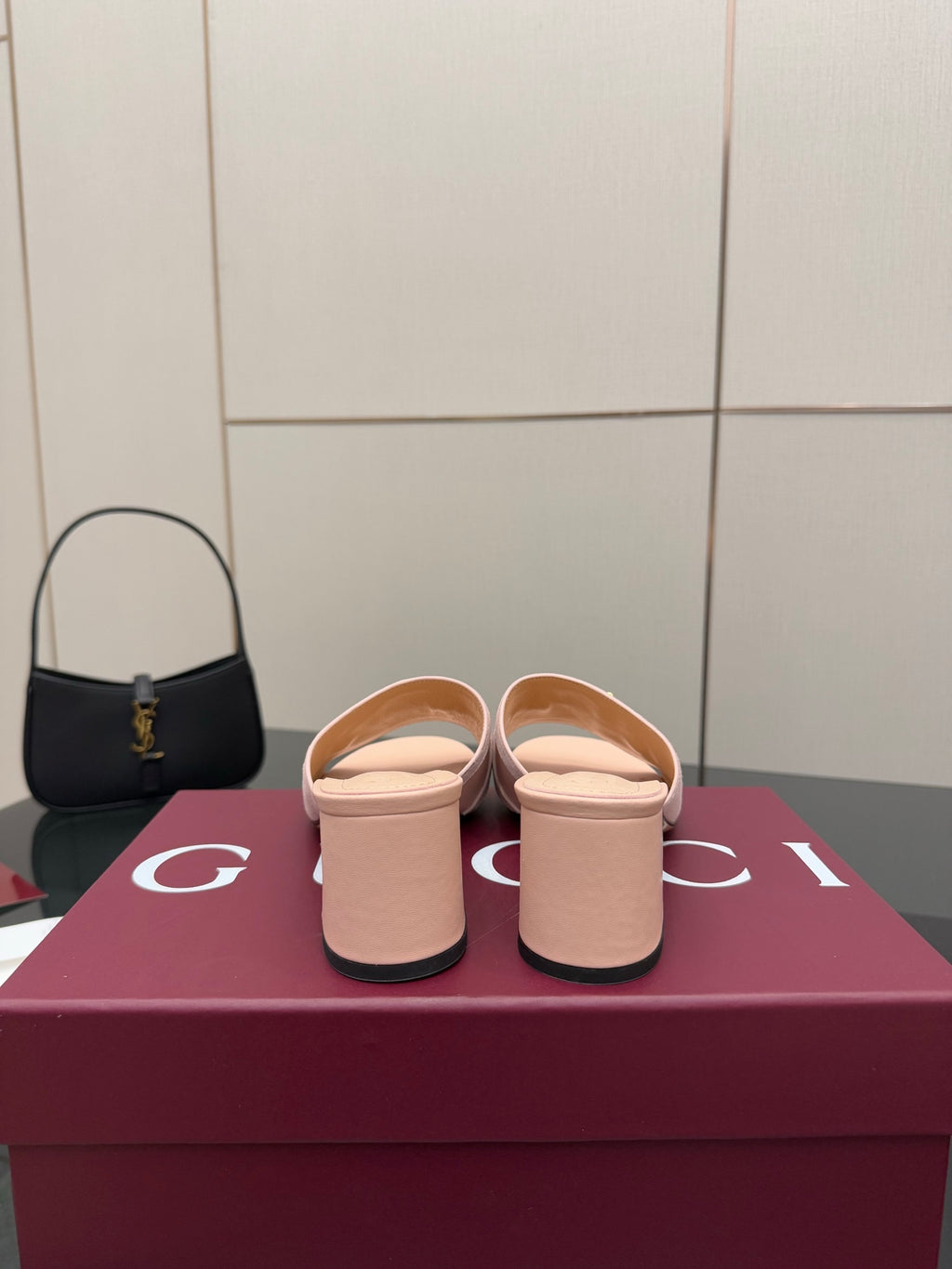 Gucci women’s mule slides, light pink pair with matching heels and back view