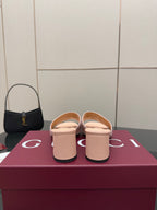 Gucci women’s mule slides, light pink pair with matching heels and back view