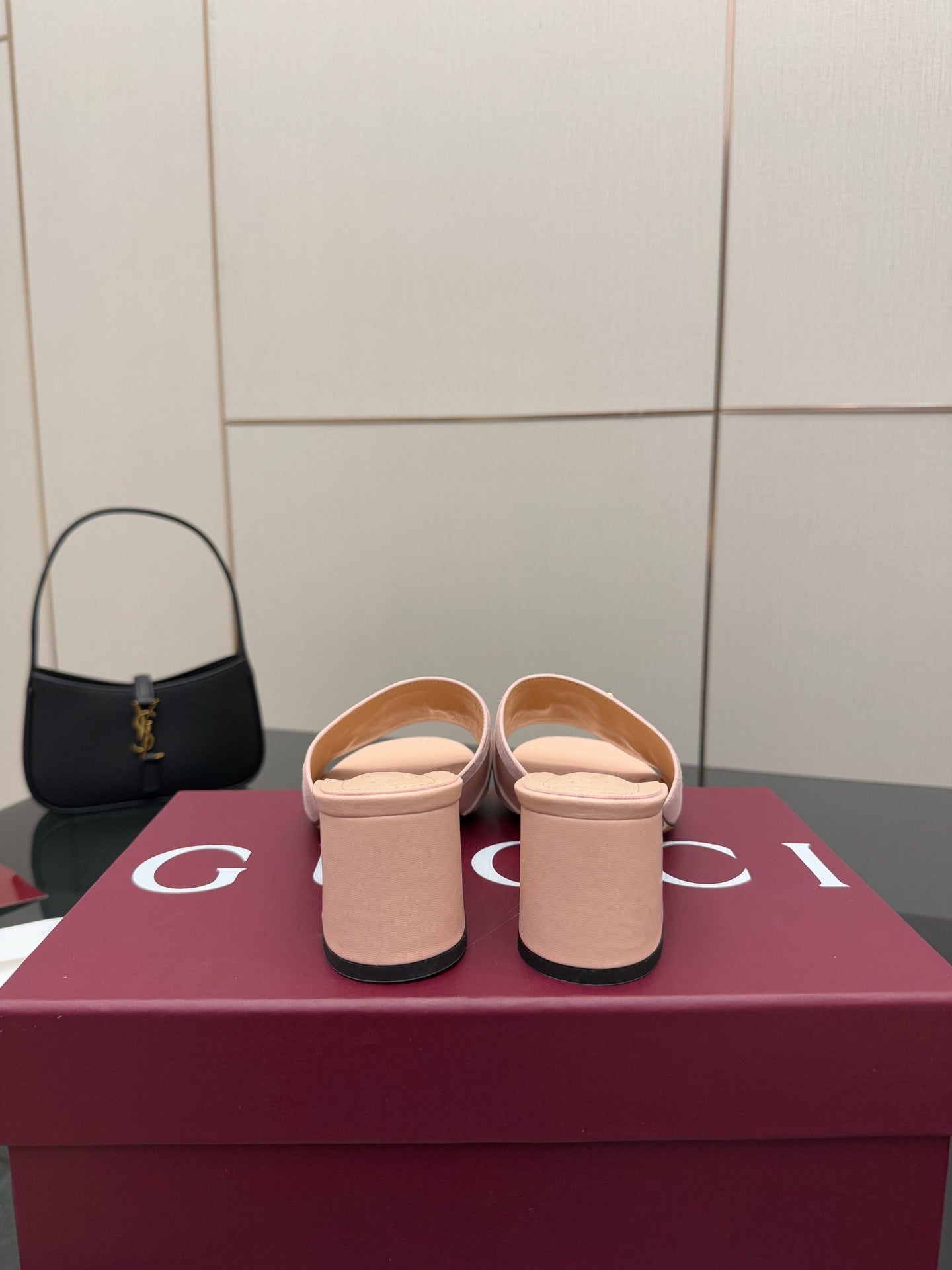 Gucci women’s mule slides, light pink pair with matching heels and back view