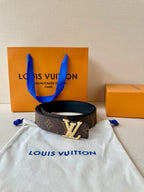 Brown monogram Louis Vuitton-style belt with gold-tone LV center buckle