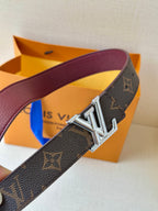 Louis Vuitton monogram belt with burgundy strap and LV-engraved silver buckle