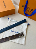 Monogram belt with gold LV buckle, dark strap with adjustment holes