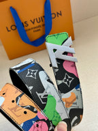 Multicolor designer belt with large gold buckle and patterned strap