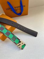 Louis Vuitton belt with black leather strap, green check strap and gold-tone buckle detail
