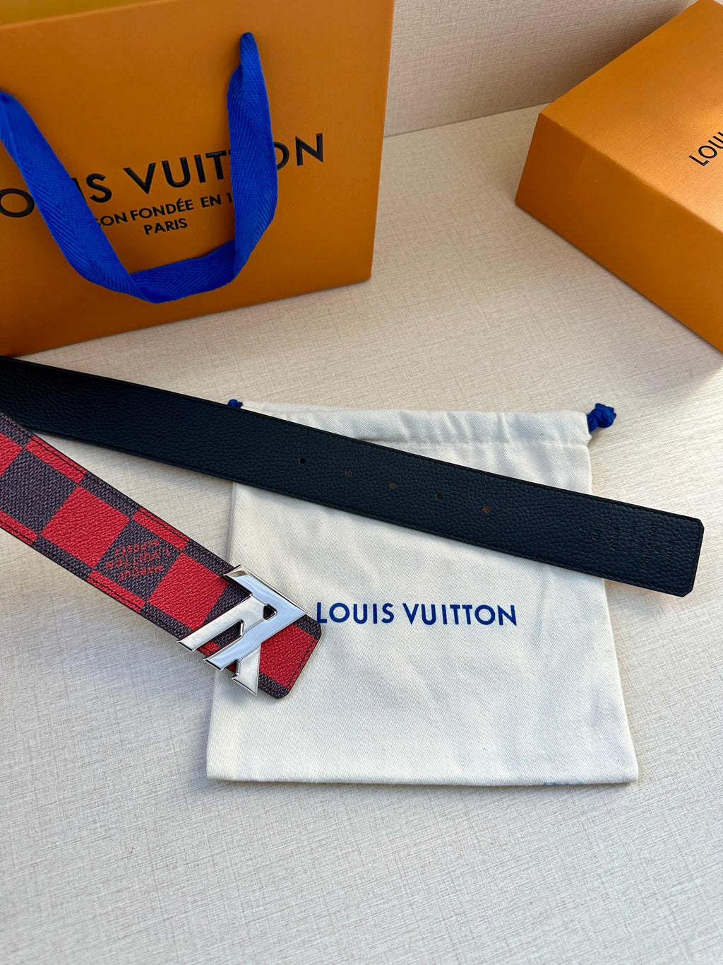 Louis Vuitton belt with checkered strap and silver-toned buckle on white pouch