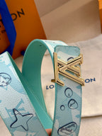 Turquoise Louis Vuitton belt with gold-tone LV buckle and stamped monogram motifs