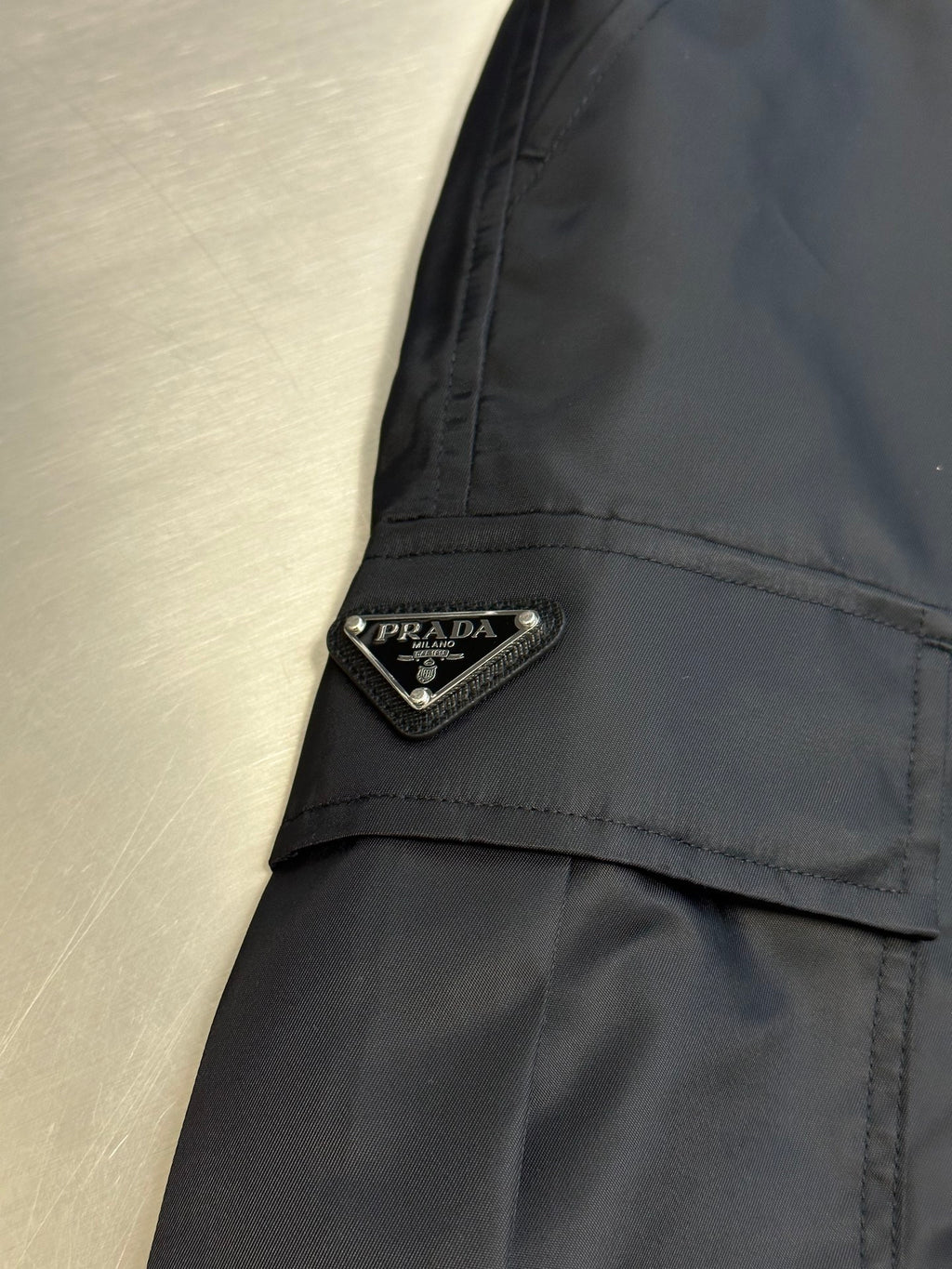 Prada nylon shorts, black, side seam pocket with PRADA logo patch detail