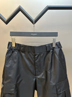 Prada re-nylon cargo shorts, dark black, elastic waistband and cargo side pockets